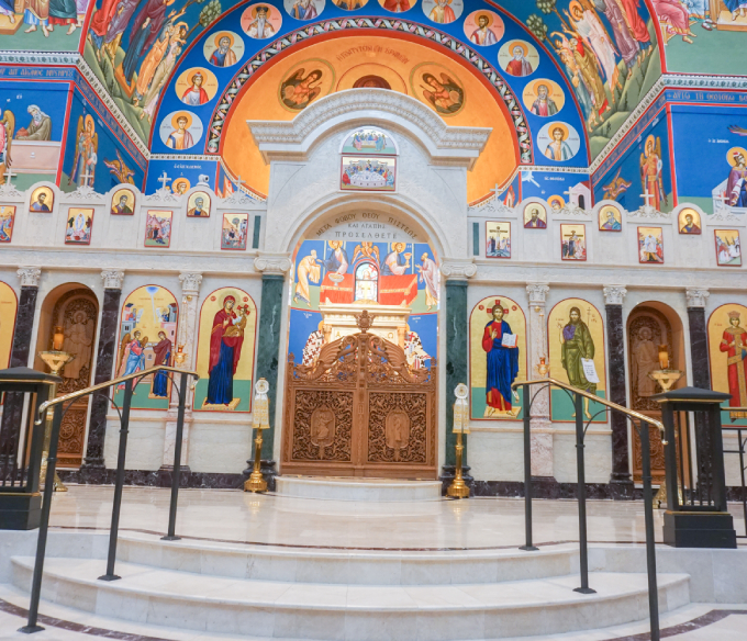 Ornate religious interior with decorative metalwork designed and fabricated by Renfrow+Co for a church project