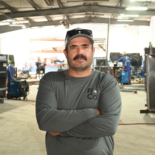 Portrait of Luis Ramirez, Field Manager at Renfrow+Co, overseeing on-site operations for custom metal and woodwork projects in Houston Portrait of Luis Ramirez, Field Manager at Renfrow+Co, overseeing on-site operations for custom metal and woodwork projects in Houston
