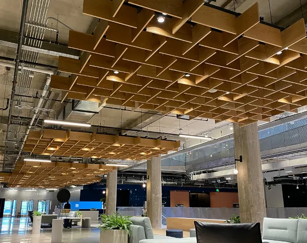 Interior view of The Ion with a unique suspended ceiling made of wooden panels, fabricated and installed by Renfrow+Co Interior view of The Ion with a unique suspended ceiling made of wooden panels, fabricated and installed by Renfrow+Co