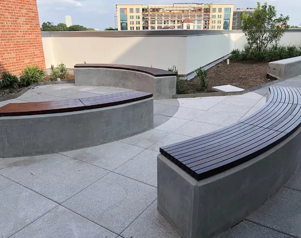 Renfrow+Co fabricated curved wooden-top benches and a large wooden cross for the outdoor area at River Oaks Baptist School Renfrow+Co fabricated curved wooden-top benches and a large wooden cross for the outdoor area at River Oaks Baptist School