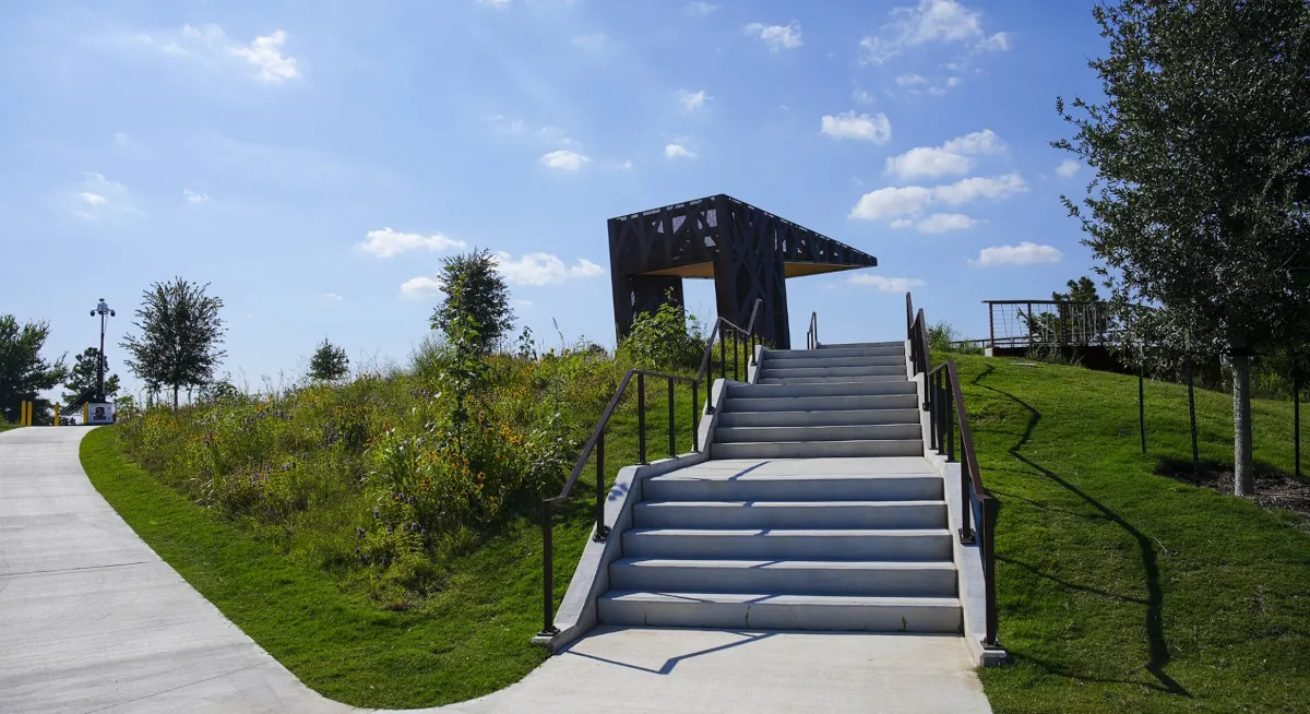 Distant shot of custom fabricated pavilion at Hill at Sims Park