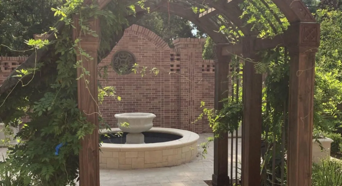 Wooden garden arch designed by Renfrow+Co framing a peaceful fountain in the landscaped courtyard of St. Martin’s Episcopal Church Wooden garden arch designed by Renfrow+Co framing a peaceful fountain in the landscaped courtyard of St. Martin’s Episcopal Church